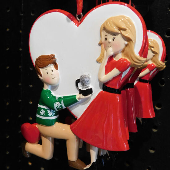 Couple getting engaged Ornament