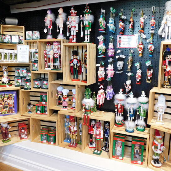Assortment of Nutcrackers on a shelf at the Just Christmas Store