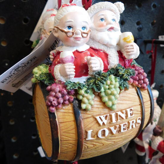 mr and mrs clause in a wine barrel