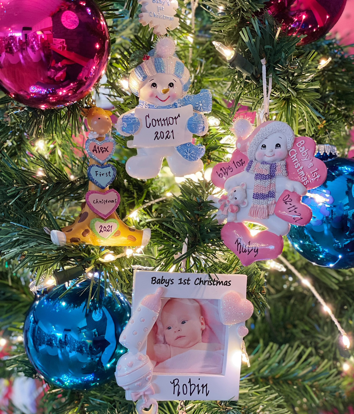 Baby's first Christmas ornaments are a treasured memory for families. We can personalize these for free while you wait!